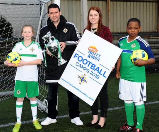 Former Northern Ireland international David Healy teamed up with Ruth Sloan from sponsors Irwins Bakery and young players Melody Conville and Kalid Alaga to launch the Nutty Krust Easter Football Camps for 2016.