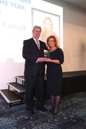 David Bingham, Chief Executive of HSC Business Services Organisation presents Kay Carroll, Head of Service for Cardiology, Southern Health and Social Care Trust with the Institute of Healthcare Management, Manager of the Year Award 2016.