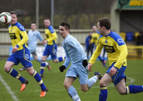 Striker Gareth Brown scored and played his part Institutes win at Bangor, on Saturday.