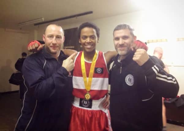 Celebrations as Mosa Kambule does the double for Lisburn Boxing Club.