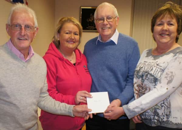 Kellswater & Tullynamullan Cultural Group present a cheque for Â£300, the proceeds of their recent Beetle Drive, to Angel Wishes N.I., a charity set up in February 2015 by Gaye Kerr in memory of her twin children, Helen and Brian, who both passed away as a result of cancer related illness. Included are Des McCaughern (Secretary), Gaye Kerr, John Cupples (Chairman) and Gayes sister Dianne Allen (Assistant Secretary). Angel Wishes aims to provide special treats for children in Northern Ireland faced with a diagnosis of cancer. (Submitted Picture).