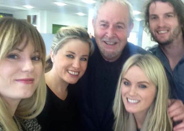 David McCrory with his sisters Rachel, Emma and Rebecca, at the BBC Radio Ulster studios in Belfast with broadcaster Gerry Kelly
