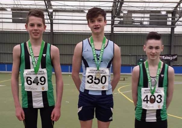 Ballymena & Antrim Athletic Club members Mathew Corr and  Joshua Courtney who were second and third in the high jump at the NI and Ulster Age Group Indoor Championships.