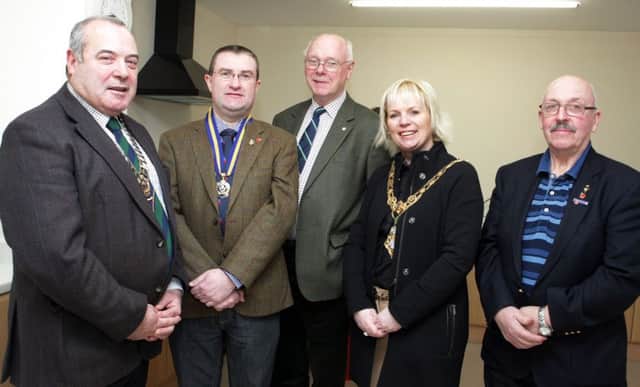 EXTENSION. Pictured in the newly extended kitchen at the RBL on Wednesday night are George Black, N.Ireland RBL Chairman, Mark McLaughlin, Branch Chairman, John Pinkerton, President, Mayor, Cllr Michelle Knight-McQuillan and Roland Hill, Club Vice-Chairman.INBM7-16 001SC.