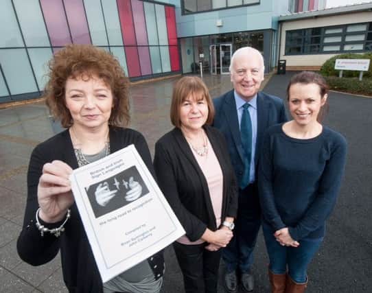 Culture Minister Caral Ni Chuilin MLA pictured with Anne Magee, school principal, Brian Symington, project manager, and Emma Rogers, parent, as she visited sign language classes and creche facilities at Jordanstown School which were funded through the department. INNT 07-520CON