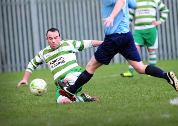 Cookstown Celtic's Gerard Moore wins the ball in the middle of the park during Saturday's league clash with Hillstreet played at the Fairhill.INMM0516-389