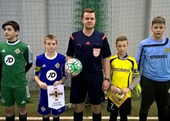 Ballymena United Youth Academy's Sean McAllister (blue shirt), who captained the Northern Ireland under-13 team in their recent game in Latvia.