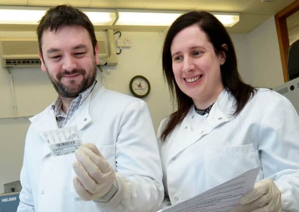 Dromore man Graham Scott and colleague Mairead Caraher. The two biomedical scientists from the Southern Health and Social Care Trust have recently gained their Higher Specialist Examination and  are the only 
two to hold this award in their respective fields in Northern Ireland.
