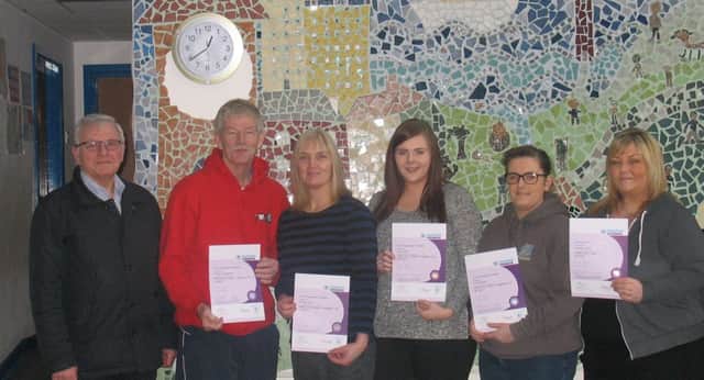 L-R: Larne YMCA Chairperson Dr Brian Dunn with Larne YMCA staff William Montgomery, Veronica Kane, Nicole Allen, Chloe Brownlee and Leanne Doherty, all of whom successfully completed their Level 3 Paediatric First Aid training.