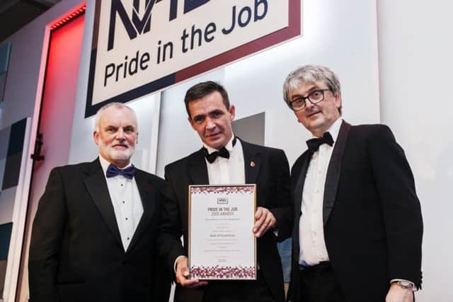Ricky Morrow (centre), site manager, Vaughan Homes, won a NHBC Seal of Excellence Pride in the Job Award, included are David Little,  NHBC  regional director and Chris Rash, NHBC commercial & chief financial officer. INCT 07-790-CON