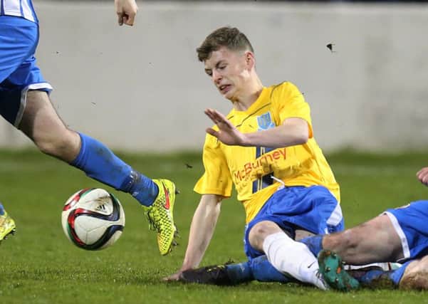 Stewart Nixon's late goal saw Ballymena United under-19s to defeat St Oliver Plunkett YC and reach the IFA Harry Cavan Youth Cup final.
