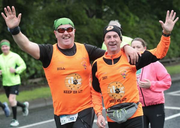 Bill Donnelly and Davy Garey enjoying their run, during last year's Walled City Marathon.