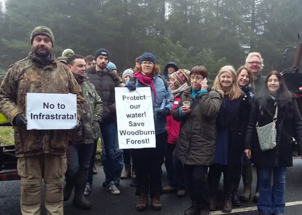 Stop the Drill campaigners protesting against InfraStrata's plans for exploratory drilling at Woodburn Forest.