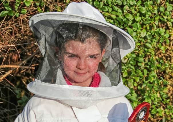 Lorna Ashcroft was the youngest person to pass the Preliminary Beekeeping Course in 2015. INNT 07-500-SO Pic by Shirley O'Neill