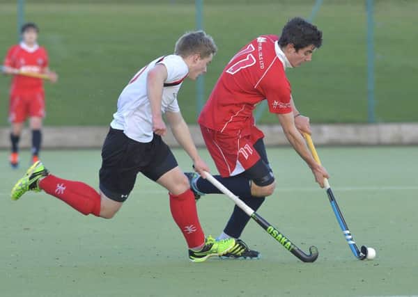 Mandatory Credit: Rowland White / PressEye
Men's Hockey: Premier
Teams: Annadale (white) v Cookstown (red)
Venue: Lough Moss
Date: 3rd January 2015
Caption: Mark Crooks, Cookstown and Peter McKibbin, Annadale