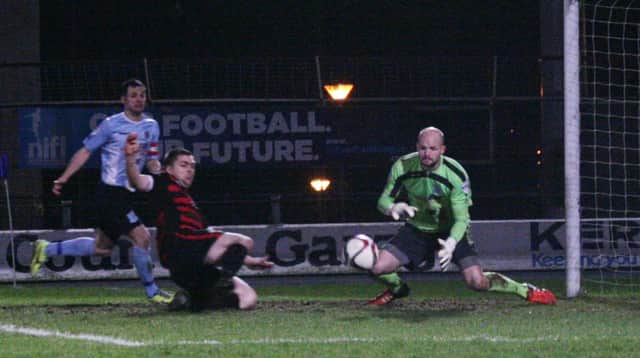 James McLaughlin nips in ahead of Blaney to score Coleraine's second at Ballymena United on Friday evening. wk0731mb