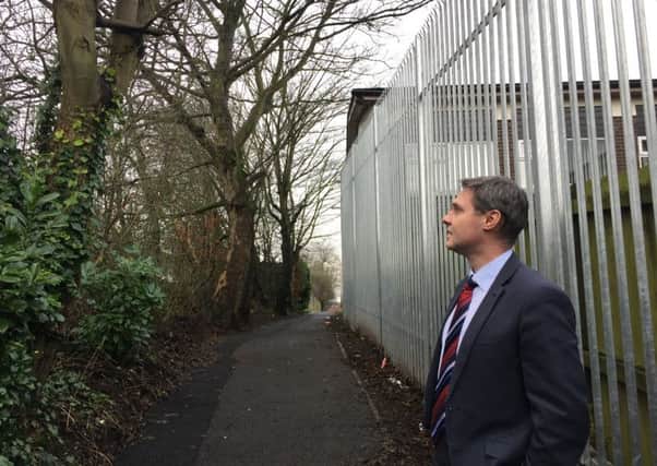 Paul Frew MLA pictured at the path between the Doury and Cushendall Roads. (Submitted Picture).