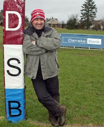PAST AND PRESENT. Teacher John Devlin, who joined the staff at Dalriada in 1993, the same year the school's 1st XV rugby team last played at the then Ravenhill in the Ulster School's Cup.INBM8-16 013SC.