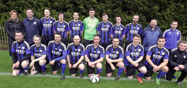TAKE CREDIT. Manager of sponsors KRD Credit Union, Claire Doherty, pictured with Riada FC in their new strip prior to their Shield game on Saturday. Included along with Manager Ricky Mooney are club Officials.INBM8-16 014SC.