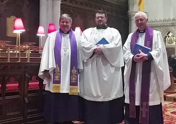 Simon McGonigle, centre, with the Dean of Derry, Very Rev Dr Wm Morton, left and Canon John Merrick, right.