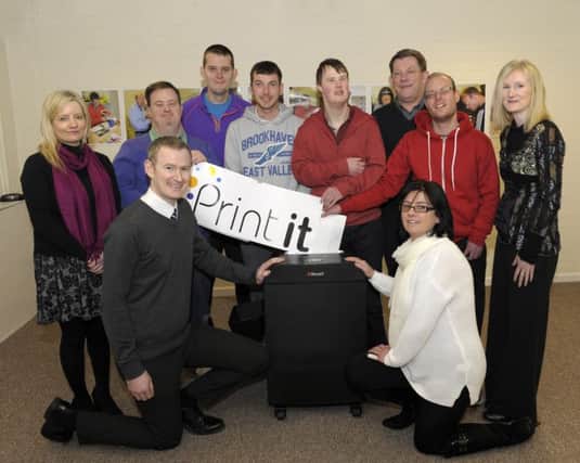 On behalf of local business Taranto James Murray and Julia Byron presented a shredder to Print It, included with Trainees Paul Ewbanks, Conor McBride, David Warburton, Jonathan Carlisle and Nicholas Begley are Appleby Trust Ltd Company Manager Elaine Leonard, Designer / Print Shop Co-ordinator Paul Campbell and Appleby Support Worker Michelle McGarvey Â©Edward Byrne Photography INBL1608-209EB