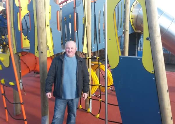 Cllr Reuben Glover at the refurbished playpark in Harryville. (Sumitted Picture)