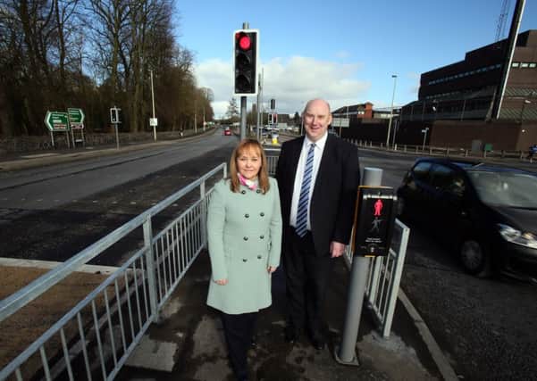 Transport Minister Michelle McIlveen with Alan Keys,TransportNI, Network Manager,pictured in Antrim at the newly completed road improvement programme.
