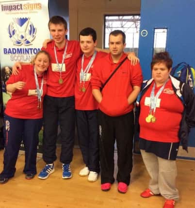 The Lisburn 2gether team of Gary Bailie, Adam Smyth, Ben Hayward, Abbie Fusco and Jackie Robins show off their medals from the Scottish leg of the Four Nations Parabadminton.