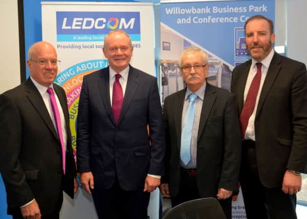 Henry Fletcher, chairman of LEDCOM; Deputy First Minister, Martin McGuinness; Sinn Fein MLA, Oliver McMullan; LEDCOM chief executive, Ken Nelson.  INLT 09-728-CON