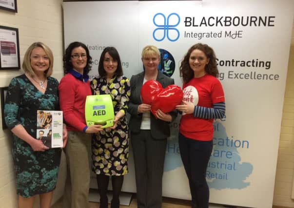 Celebrating the installation of a defibrillator at Blackbourne in Antrim are from (l-r) Carol Burrows, St Johns Ambulance, Catherine Blackbourne, Blackbourne Finance Director, Cathy McGarry, Blackbourne Marketing Assistant, Marie Hodgson, Blackbourne HR & Operations Director and Sinead Magill, Senior Corporate Fundraising Executive, Northern Ireland Chest, Heart and Stroke. (Submitted Picture).