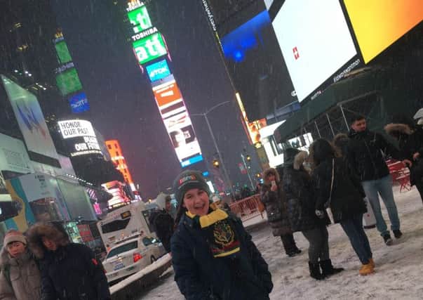 Tait Brennan in Time Square, New York. INLT-09-704-con