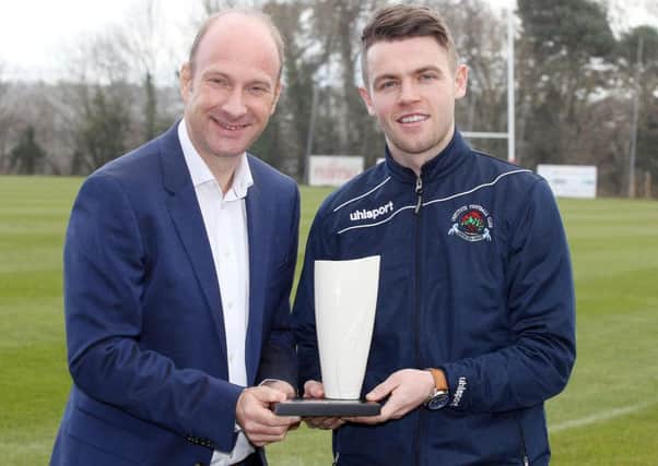 Institute's Shane McGinty pictured receiving February's Northern Ireland Football Writers' Association's Championship Player of the Month award from Stephen Watson, Chairman Northern Ireland Football Writers' Association. Picture by Kelvin Boyes/Press Eye