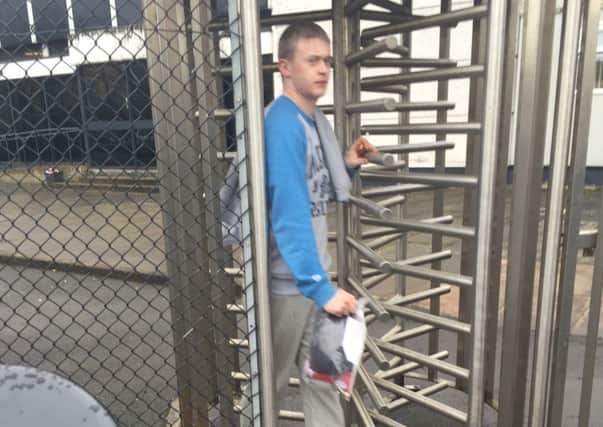Christopher Owens, accused of arson at St. Peter's GAA club, leaving Lisburn court.