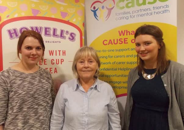 Pictured at a CAUSE support group meeting in Lurgan is Ruth Sloan of Howell's (left) and Anne Cunningham and Fiona Quinn of CAUSE. The Northern Ireland-based cake and biscuit brand surprised the group with treats for their meeting to highlight the work CAUSE does for the community.