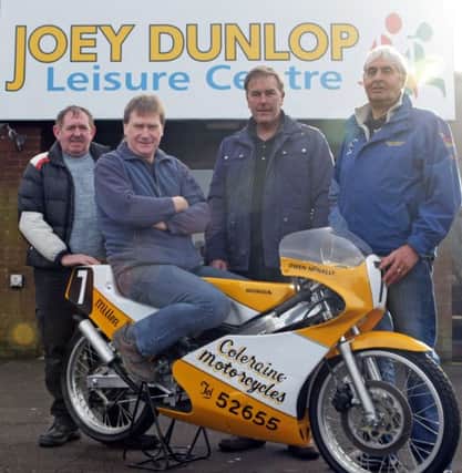 HONDA FIRST. Pictured with the late Owen McNally's first Honda racing bike at the JDLC on Wednesday along with Davy Louden (right), organiser of the forthcoming Bike Show are Ivor Skelton, Owner/Restorer and bike sponsors, Wilfy Connor (Coleraine Motorcycles) and Kieth Millen (Millen Racing).INBM8-16 004SC.