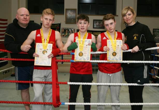 Mickey Fleming and Roberta Gaile (coaches) pictured with Churchlands boxers Matthew Boreland, Ben Henderson and Ross Henderson. INCR8-300PL