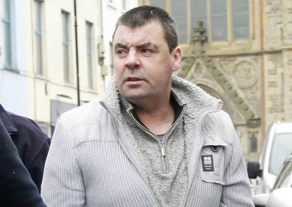 Seamus Daly arrives at Omagh court in county Tyrone, he is accused of murdering 29 people in the Real IRA bomb in Omagh in 1998.