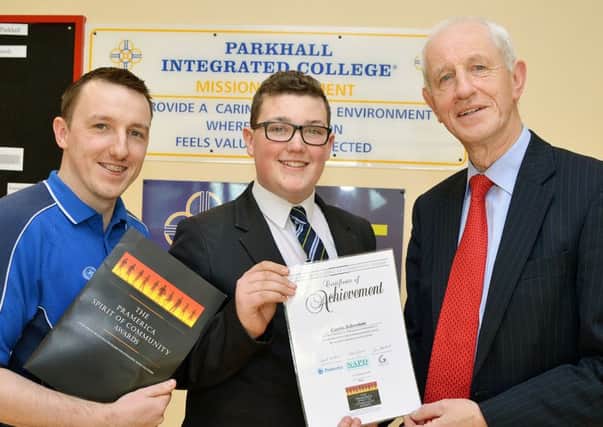 Curtis Johnston, a Year 12 student at Parkhall Integrated College, who is one of of 20 finalists in the 2016 Pramerica Spirit of Community Awards,  Included is Mark Crothers and Ivan Arbuthnot. INBT 24-825H