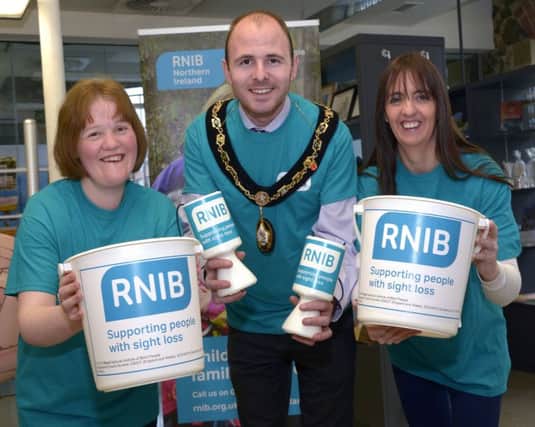 Armagh City, Banbridge & Craigavon Borough Council Lord Mayor Cllr Darryn Causby pictured with Banbridge RNIB Volunteers Ann Sterritt and Beverley Thom to promote the Coffee Morning in The Old Town Hall Banbridge on Saturday 12th March Â©Edward Byrne Photography