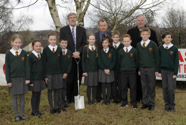Pupils from St Mary's Primary School joined Education Minister John O'Dowd MLA to cut the first sod at the new school site, included is Principal Des O'Hagan and Board of Governors Chairman Very Rev Canon Liam Stevenson PP Â©Edward Byrne Photography INBL1609-208EB