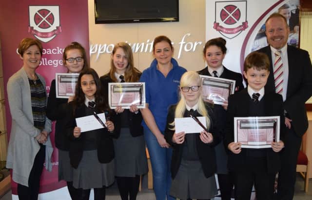 Pictured back row: Mrs A Rodger (Head of Home Economics), Rebecca Thompson (Yr9), Aoife Conney (Yr9), Ms Millar (Toast), Shana Simpson (Yr8), and Mr Donaldson (College Principal); front row Dara Borges (Yr9), Zoe Cubbit (Yr8) and Christopher Boyd (Yr8).