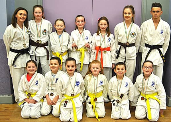 Kildress Wado-Kai Karate Club are pictured with their coaches, Martina Gilmore 1st DAN JKF (left back row) and Conor Gilmore 1st DAN JKF (right back row).