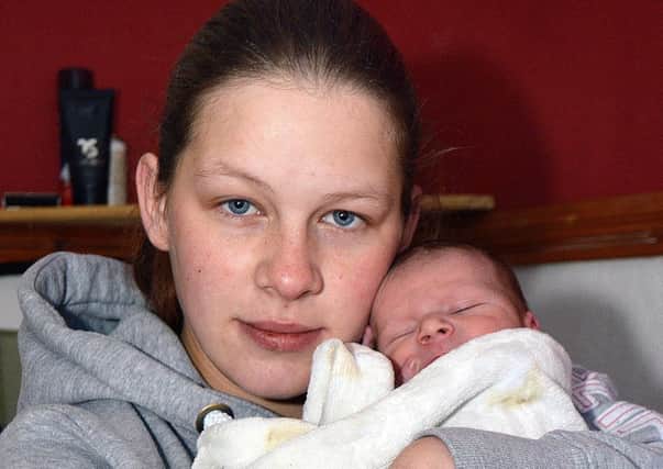 Ksenija Kislova and ner newborn daughter Veronika. INPT08-202.