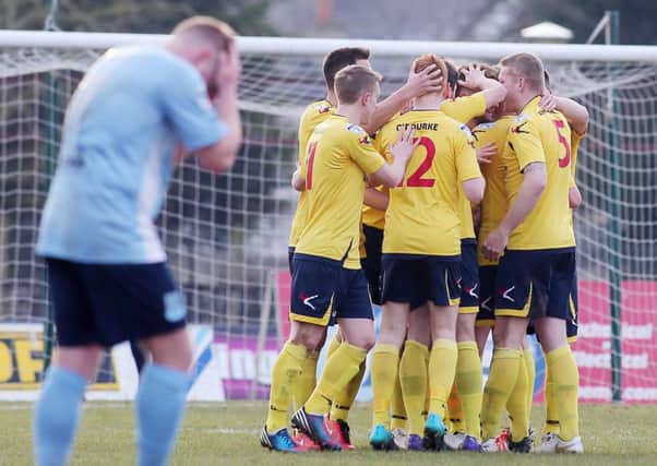 David Cushley's reaction says it all as Dungannon Swifts celebrate their fourth goal against Ballymena United on Saturday. Picture: Press Eye.