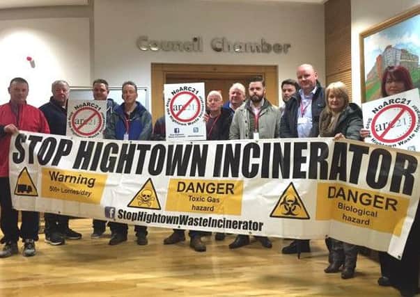 NoArc21 campaigners making their point outside the council chamber on Monday night, February 29. INNT 09-516CON