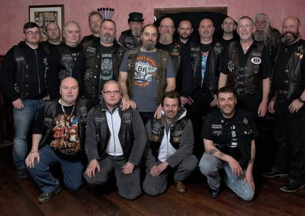 Members of the Lone Wolves Brotherhood Motorcycle Club. Pictured centre is Club President Sammy Wilson,  and to his left is John  Hutch Hutchinson. INLT-10-716-con