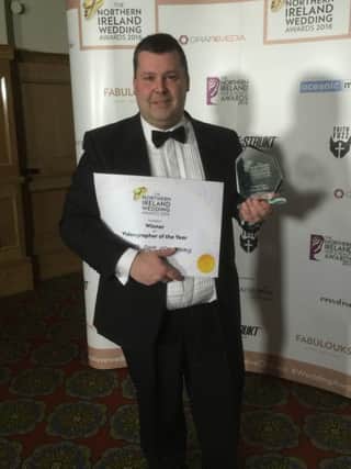 Gary McKinstry with his Videographer of the Year award.