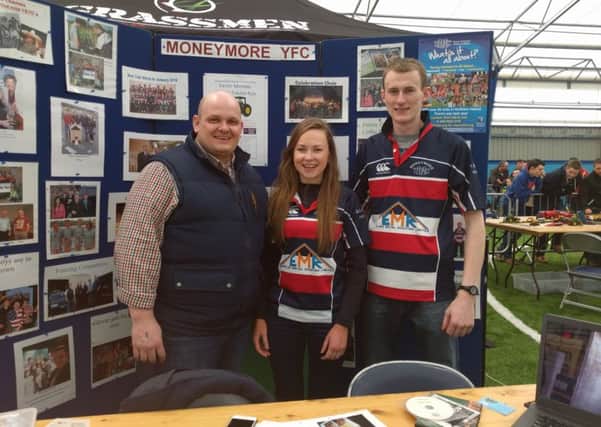 DUP Mid Ulster MLA Ian McCrea chatting with members of Moneymore Young Farmers Club about their Tractor Run on Easter Monday 28 March 2016, at the Mid Ulster Model Show.