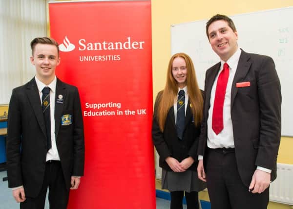 Patrick Moohan pictured with year 13 pupils, Sam Rodgers and Jennie Haggan.  INCT 10-721-CON