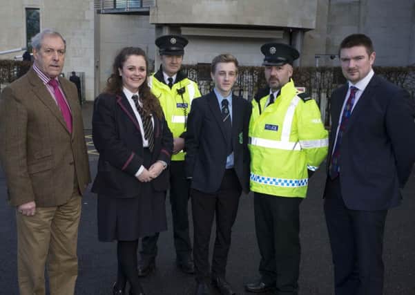Pictured (l-r) are; Cllr Uel Mackin, PCSP, Lisburn & Castlereagh City Council; Inspector Nigel Rowland, Constable John Wilson, Cllr Scott Carson, PCSP Chairman, Lisburn & Castlereagh City Council with pupils from Wallace High and Forthill College.